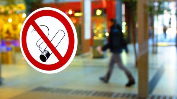 is the smoking ban detrimental to Abu Dhabi's businesses?