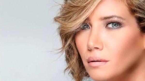 Sulafa Mimar with her lighter color locks