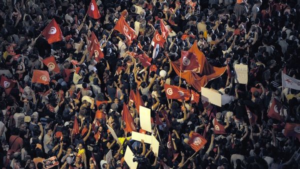 Tunisians chant slogans in front of the National Constituent Assembly on August 6, 2013 in Tunis. (AFP)