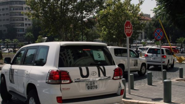 A convoy of United Nations (UN) vehicles leave a hotel in Damascus on August 26, 2013 carrying UN inspectors travelling to the site of a suspected deadly chemical weapon attack the previous week in Ghouta, east of the capital. (AFP)