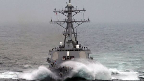 Waves crash over the bow of the Arleigh-Burke-class guided missile destroyer USS Barry, one of those deployed to the Mediterranean in anticipation of a military strike on Syria. (AFP)