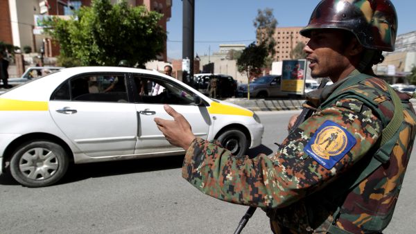 A Yemeni soldier mans a checkpoint in Sanaa on Wednesday as authorities stepped up security measures ahead of an extraordinary UN Security Council session in Yemen on Sunday. (AFP Photo/Mohammed Huwais)