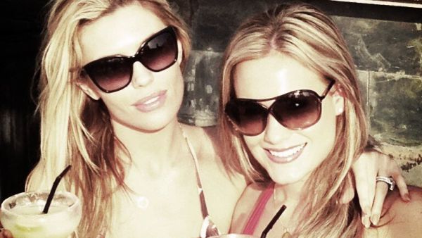 Abbey Crouch poses with a pal in the sunshine (Photo: Twitter / Abbey Crouch)