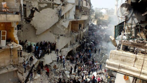 Regime airstrikes have reduced many Syrian towns to rubble (AP)
