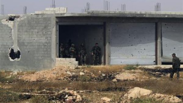 جنود من القوات النظامية في القصير