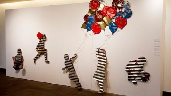 Katanani’s wall installation depicts children at play. (The Daily Star/Hasan Shaaban)