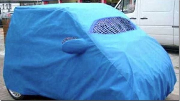 A car cover that looks like an Afghani burkah. 