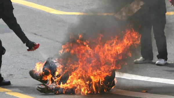 A man on fire, endless pain.