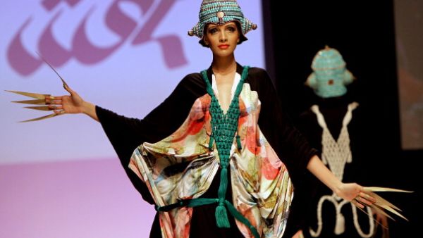 A model presents a creation of Emirati designer Abir al-Suwaidi during Spring/Summer 2011 Dubai Fashion Week in the Gulf emirate.