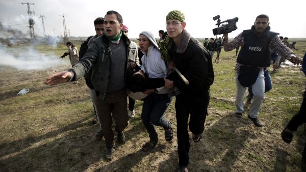 Israeli troops recently fired tear gas at Gazan protestors on the border last week, wounding two Palestinians (Mohammed Abed/AFP) Israeli troops recently fired tear gas at Gazan protestors on the border last week, wounding two Palestinians (Mohammed Abed/AFP)