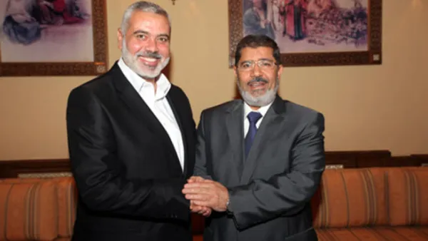 هنية وزع الحلوى بعد فوز مرسي
