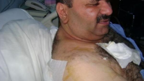 Husam al Abdallat speaking from his hospital bed. 