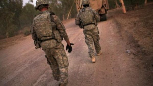 جنود اميركيون يشاركون في دورية في ناحية الاسكندرية بمحافظة بابل
