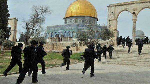 After they entered the Al Aqsa mosque compound under armed guard, Israelis clashed with Palestinian Muslim worshippers in Jerusalem on Wednesday (AFP/File) After they entered the Al Aqsa mosque compound under armed guard, Israelis clashed with Palestinian Muslim worshippers in Jerusalem on Wednesday (AFP/File)