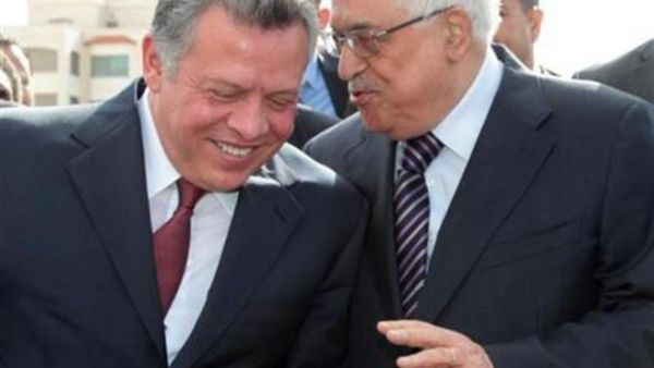 العاهل الاردني الملك عبد الله والرئيس الفلسطيني محمود عباس في الضفة الغربية يوم الخميس
