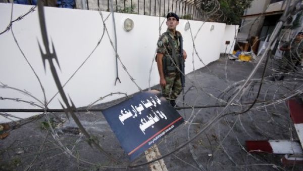 Lebanese soldiers block a road leading to the American embassy in eastern Beirut. (AFP)