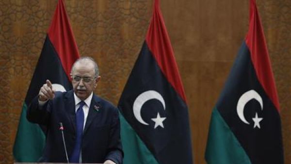 رئيس الوزراء الليبي عبدالرحيم الكيب خلال مؤتمر صحفي في طرابلس
