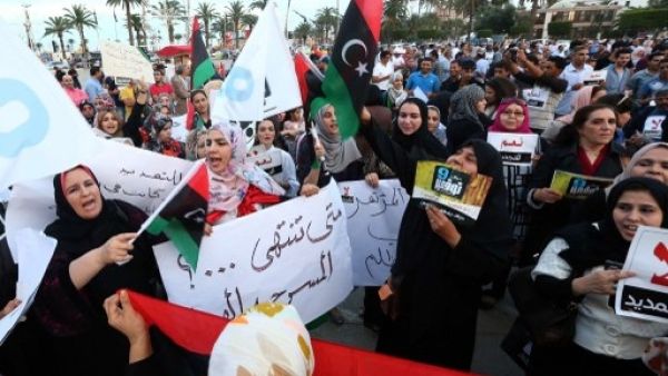 Protestors gathered in Tripoli's Martys' Square Saturday in opposition of calls to renew GNC's mandate, saying that an extension will only "push Libya into further turmoil" (Mahmud Turkia/AFP)