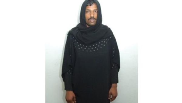 A man donned an abaya for UAE Ladies Day but the moustache gave him away