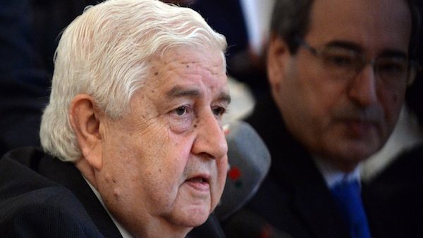 Syrian Foreign Minister Walid Muallem (L) gives a press conference with his Russian counterpart Sergei Lavrov on September 9, 2013 following a meeting in Moscow. (AFP)