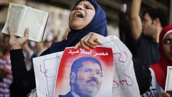 A supporter of the Muslim Brotherhood and Egypt's toppled President Mohamed Morsi shout slogans during a demonstration against the ouster of the former Islamist leader on Aug. 23. (AFP)