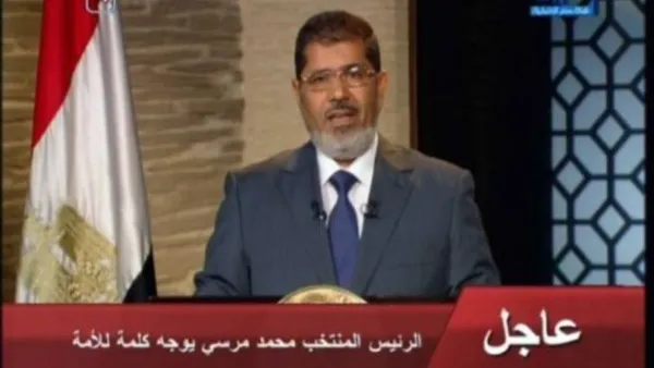 مرسي خلال القائه الخطاب