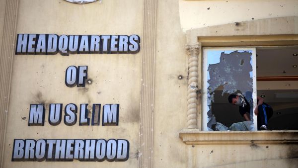 The Egyptian government banned the Muslim Brotherhood activities in September earlier this year (Khalil Hamra/AP)