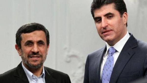 احمدي نجاد خلال لقائه رئيس وزراء اقليم كردستان العراق نشيروان بارزاني في طهران
