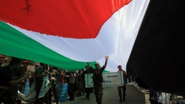 Palestinians celebrate Nakba. AFP Photo