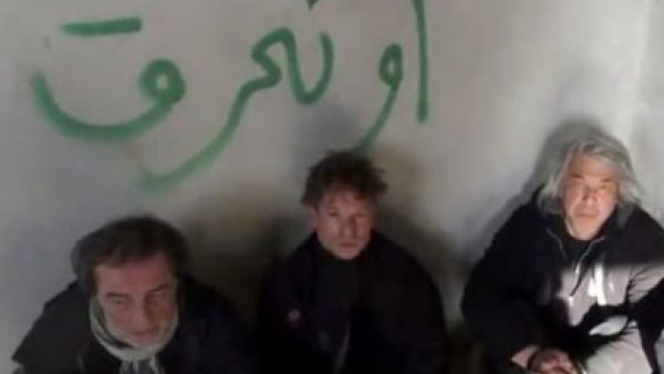 At least 52 journalists have been killed covering the Syrian conflict. Here, footage from an amateur video shows NBC chief foreign correspondent Richard Engel and several colleagues after they were abducted by an armed gang in Syria. (Image via thejournal.ie)