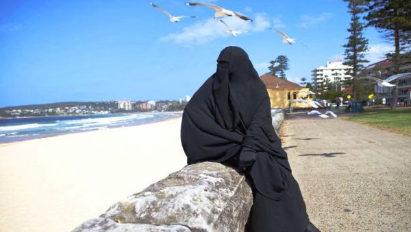 Burqa on the beach