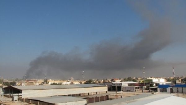 Smoke rises from Iraq's Ramadi after gunmen allegedly attempted to attack government troops (Azhar Shallal/AFP)