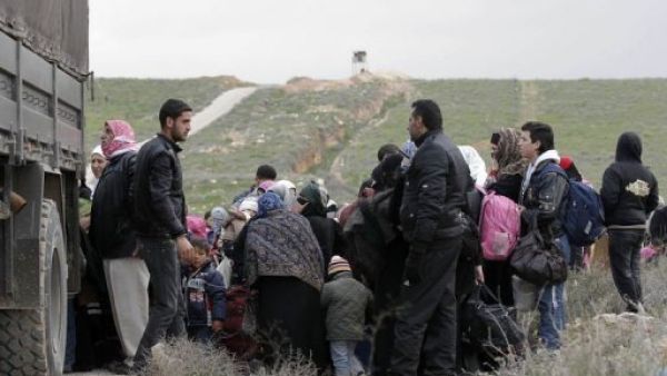 سوريون يفرون من جحيم الحرب في بلادهم