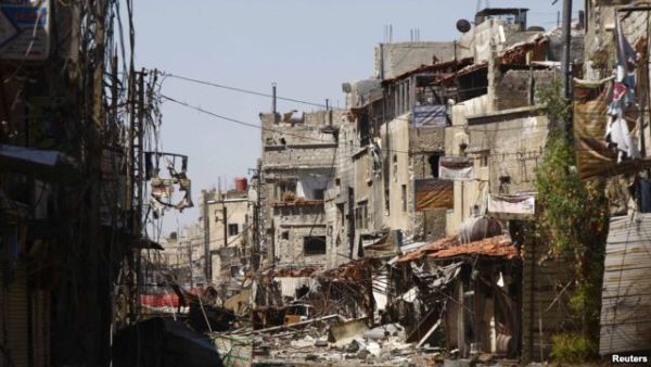 Clashes between rebels and regime forces have destroyed the neighborhoods near Sayeda Zainab (Courtesy of Voice of America)