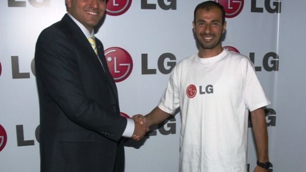 Firas Shabaneh, LG Electronics Brand and Marketing Manager shaking hands with the Jordanian Marathon Champion, Suleiman Al Zboun Firas Shabaneh, LG Electronics Brand and Marketing Manager shaking hands with the Jordanian Marathon Champion, Suleiman Al Zboun