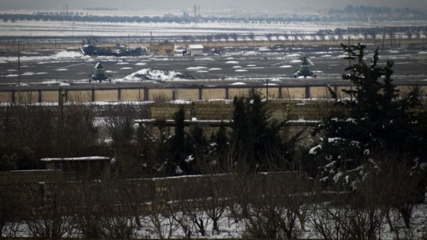 Syrian air force helicopters sit on the tarmac at the Minakh military airport near the northern city of Aleppo on Friday (Photo: AFP/ZAC BAILLIE)