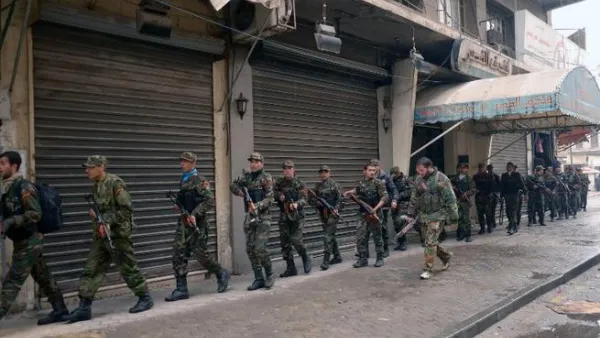Pro-regime forces backed by Hezbollah retook Aasal al-Ward from rebels (File/AFP)