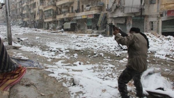 The recent snow has done little to stop the fighting between Syrian rebel and regime forces (Medo Halab/AFP)