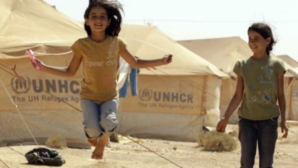 Syrian refugee children play at the Zaatari refugee camp close to the Jordanian city Mafraq, near the border with Syria