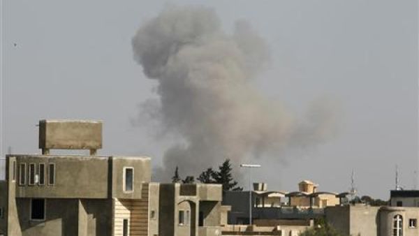 A plume of smoke is seen rising from the Libyan capital Tripoli earlier this year (file AFP)