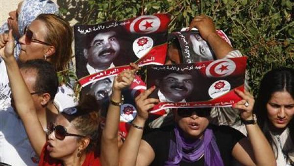 Tunisians protest after the death of Mohammad Brahimi last week. (AFP)