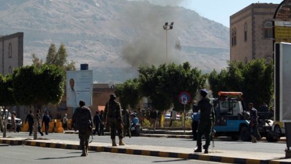 Smoke rises from the suicide bomb attack on Yemen's Defense Ministry Thursday (Mohammed Huwais/AFP)