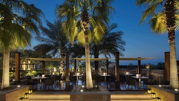 Couples can enjoy an intimate dinner under the stars in the pool cabana set up.