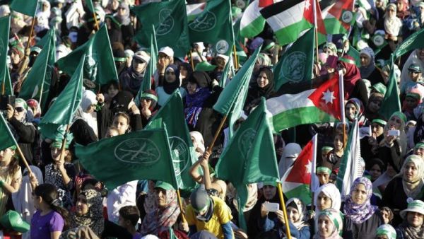 Jordanian supporters of the Muslim Brotherhood gather during a protest to celebrate the "Gaza victory" in the war against Israel, in the capital Amman on August 8, 2014. (AFP/Khalil Mazraawi)