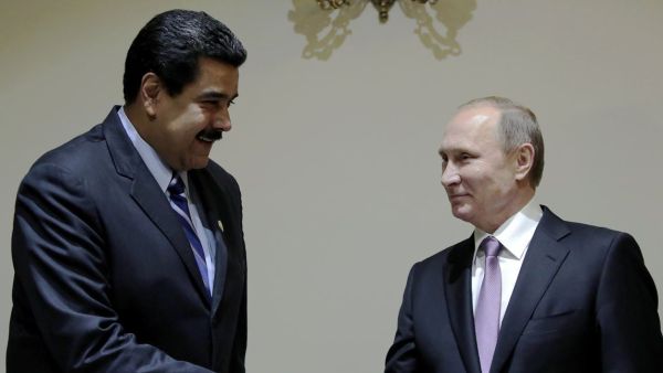الرئيسان الروسي فلاديمير بوتين والفنزويلي نيكولاس مادورو