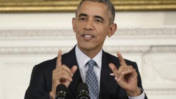 اوباما اثناء مؤتمر صحفي في البيت الأبيض بواشنطن يوم الجمعة
