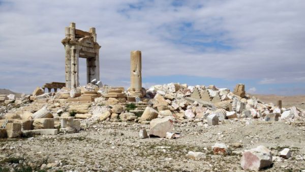 A picture shows on March 29, 2016 the remains of the Temple of Bel in the historical city of Palmyra after it was blown up by Daesh militants. 