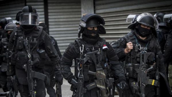 French special forces police are seen during a raid in Paris following the attacks in November. (AFP/File)