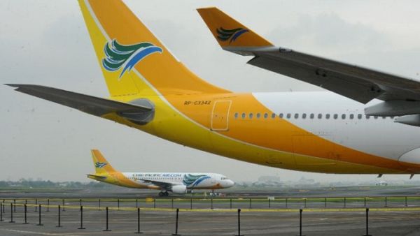 Filipino low-cost airline Cebu Pacific is suspending operations to and from Kuwait, Riyadh and Doha, claiming that these routes are no longer viable. (AFP/ Jay Directo)