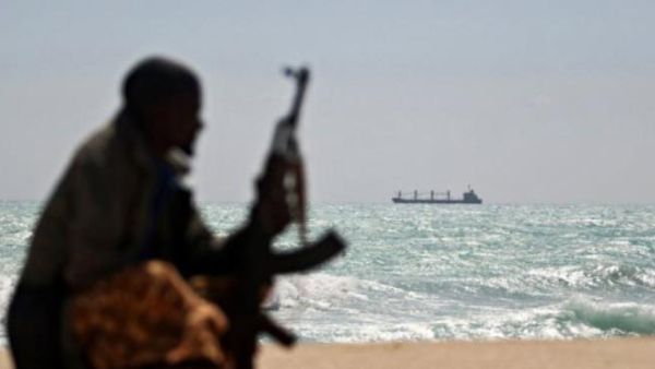 A pirate sits on the shore of a Nigerian beach, watching a ship. (AFP/Mohamed Dahir) A pirate sits on the shore of a Nigerian beach, watching a ship. (AFP/Mohamed Dahir)